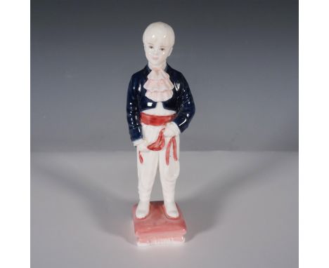 This Coalport Page Boy figurine captures the charm of a young boy dressed in a formal page boy outfit, featuring a navy blue 