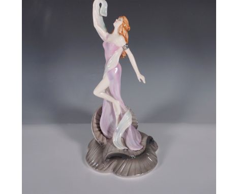 An elegant limited edition bone china figurine from the Art Nouveau Collection. Showcases a graceful woman in a flowing, soft