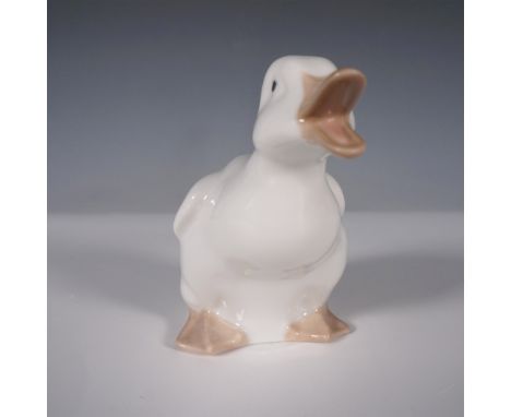 This delightful porcelain duck figurine, titled Ducks on the Run! - Little Duck (720778909), is handcrafted by NAO, a divisio