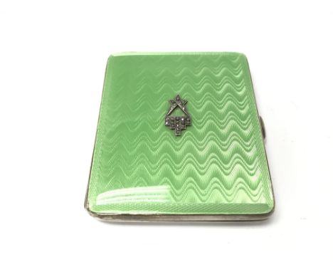 A silver and guilloche enamel cigarette case. Birmingham hallmarks. 107g. 7x8cm