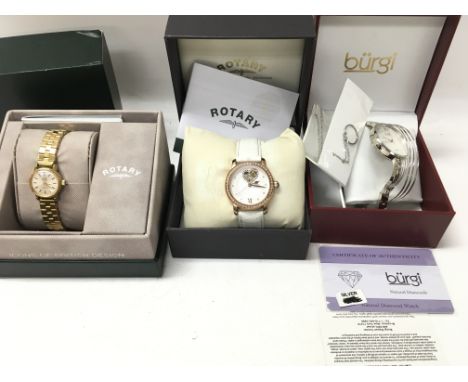 Three ladies wrist watches including a Rotary Skeleton watch with box. Also a vintage Rotary and a modern Burgi diamond watch