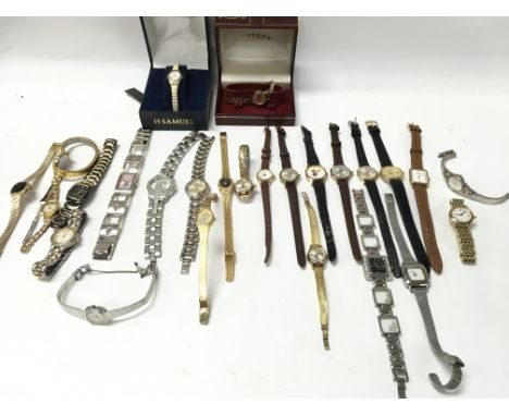 A large collection of assorted ladies watches including Rotary and Seiko examples. Both vintage and modern watches. Postage B