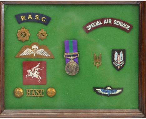 GSM 1918  1 clasp Palestine 1945-48 (T/22033369 Dvr R E J Crofton RASC) GVF, framed with RASC cap badge, collar badge, title 