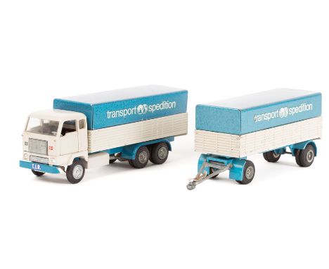 A scarce Danish Tekno Volvo FB88 forward control 10 wheeled rigid truck and 8 wheeled trailer. In light grey and light blue T
