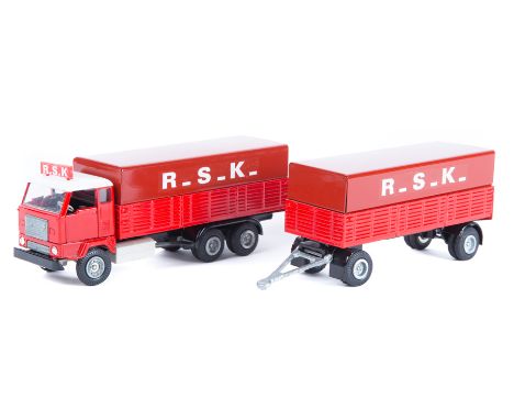 A scarce 1970’s Danish Tekno Volvo FB88 forward control 10 wheeled rigid truck and 8 wheeled trailer. Finished in two tone re