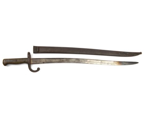 A Chassepot bayonet, d 1869 on backstrap, in its steel scabbard (dark rust patina). GC                