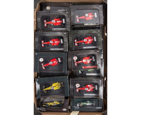 20 HotWheels 1:43 F1 racing cars. 7x Ferrari – 2000, 2001, 2002 and 2003 all M. Schumacher. 2001, 2002 and 2003 R. Barrichell