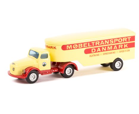 A scarce Danish Tekno Volvo normal control International Transport articulated lorry. Pale yellow tractor unit with red chass