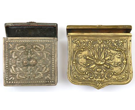 A 19th century Turkish silver plated cartouche, the front and lid embossed with scrolled floral patterns, the sides similarly