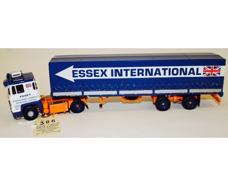 A Dutch Tekno Scania 141 V8 6 wheeled tractor unit and 8 wheeled curtain-side trailer. In Essex International livery of white