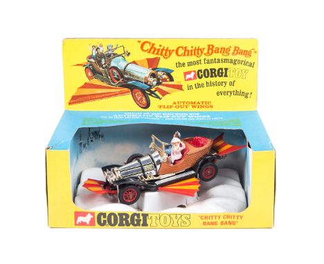 A late 1960’s Corgi Chitty Chitty Bang Bang (266). In its original display box, with all wings, male and female figures (chil