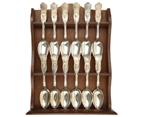 A WWI commemorative set of 12 silver plated spoons (6” length) depicting the leaders of Armed Forces in the First World War, 