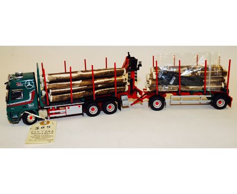 A Conrad Mercedes-Benz Actros 2651 V8 10 wheeled timber truck and 8 wheeled trailer. In Paul Hammann livery of mid green with