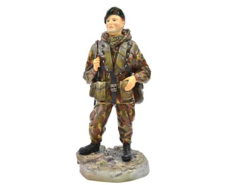 An Ashmor Falklands commemorative painted porcelain figure of a R. Marine, 40, 42 and 45 Commando, in full kit with Sten gun,