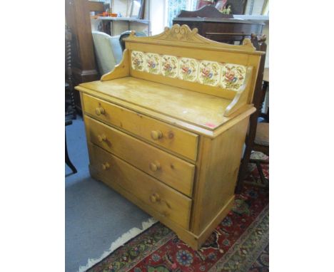 A Victorian pine wash stand with a raised tile top and three drawers, 113cm h x 106cm wLocation: 