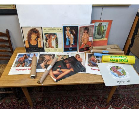 A collection of calendars and posters mainly of semi-nude women to include Dunlop 1977 Supergirl 1991, Eve 1986 and other dat