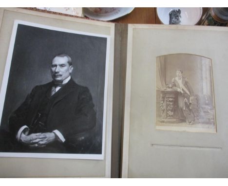 A Victorian red leather bound photograph album with silver plated catch with stamped kite registration mark and patent dates 
