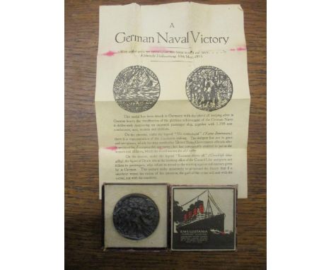 A RMS Lusitania cast metal British propaganda medal in original box with leaflet Location: Cab 