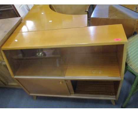 A mid-century Greaves and Thomas Put-U-Up modular sideboard comprising corner unit with twin cupboard doors below an open she