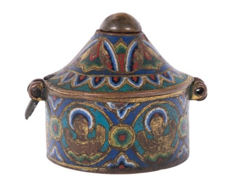 Chased and gilded copper pyx with champlevé enamel. Limoges. France. Romanesque. 13th century.In the form of a cylindrical bo