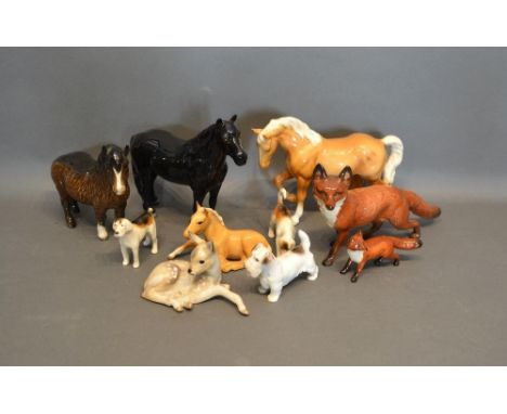 A Beswick Model of a Black Horse, together with a collection of other Beswick to include two Foxes, a Royal Copenhagen Model 