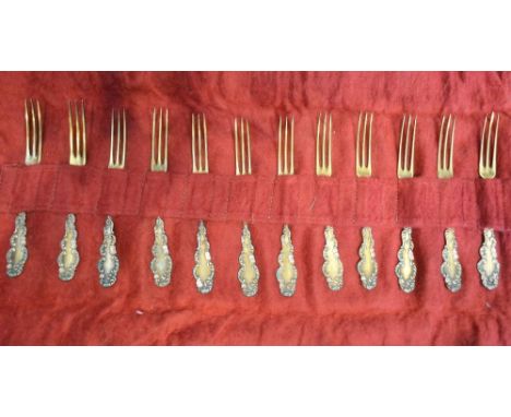 A Set of Twelve Sterling Silver Gilt and Enamel Decorated Forks 