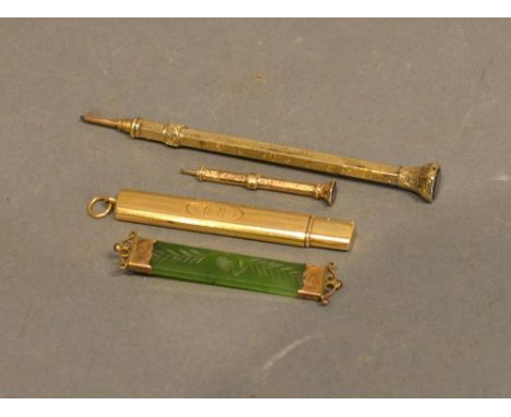 A 14ct. Gold Pencil Holder, 7.8 gms. together with two Propelling Pencils and a Jade Brooch 