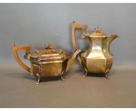 An Art Deco Silver Coffee Pot, together with a matching Teapot, Sheffield 1937, 40 ozs. all in 