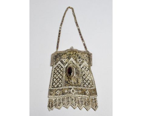 A Whiting & Davis Co mesh bag, with white and black enamel design, the front and back mounted with two large amethyst-coloure
