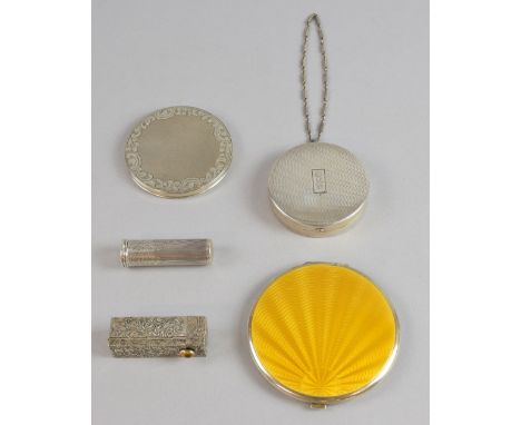 A large silver and golden yellow enamel compact maker B & G, Birmingham 1933, two other silver or white metal compacts and tw