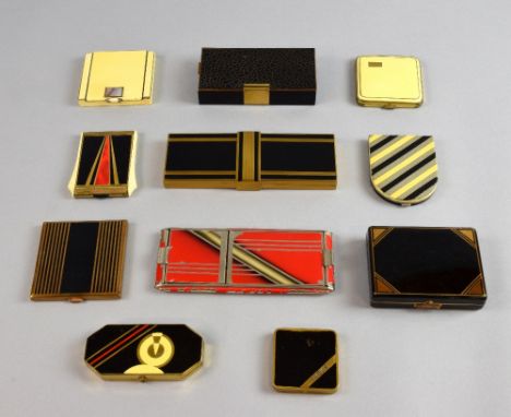 Art Deco powder compacts and keepalls in gilt and chrome with enamelled decoration in bold geometric designs of black, red an