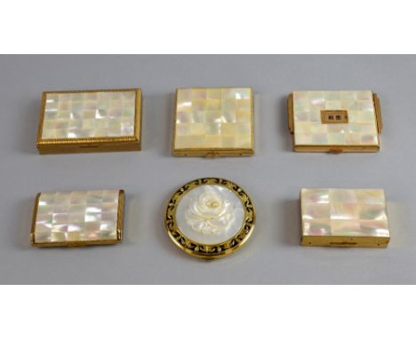 A collection of gilt powder compacts decorated with mother of pearl by Melissa, Emrich, Agme, New Light and Elgin American, t