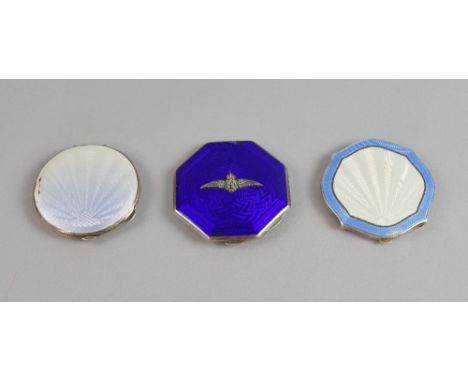 An RAF deep blue enamel and silver octagonal compact, maker JWB Birmingham 1938-9, and two other silver and enamel compacts .