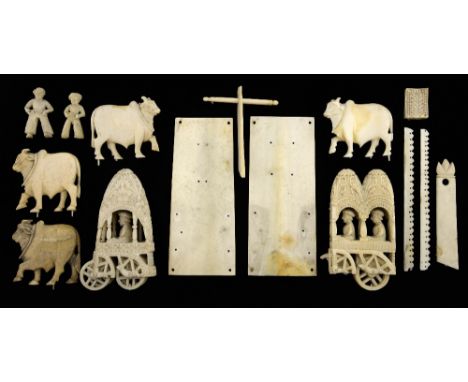 Indian carved ivory figural group of a procession of two carriages and oxen,PLEASE NOTE: THIS ITEM CONTAINS OR IS MADE OF IVO