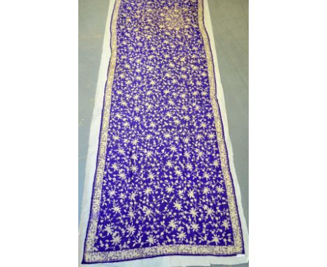 Indian Parsee gara sari, extensively  hand embroidered on purple silk with motifs of birds and flowers, probably first half 2
