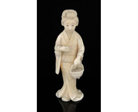 19th century Chinese carved ivory figure of a woman holding a basket, 12cm high,PLEASE NOTE: THIS ITEM CONTAINS OR IS MADE OF