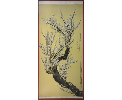 Chinese scroll painting depicting prunus blossom, with calligraphy and red seal mark, framed, 146cm x 59cm,.  