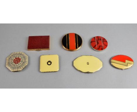 Five Art Deco design compacts, one enamelled with raised decoration of flower, four others with enamel, and two later compact