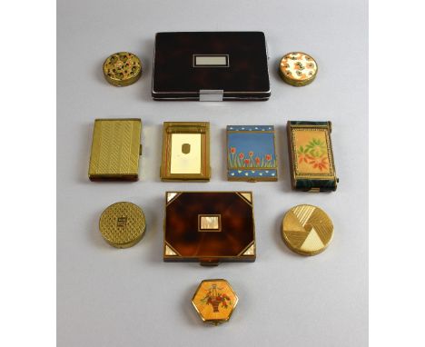 Art Deco compacts and keepalls in a variety of gilt, enamel and simulated tortoiseshell finishes, including one in the form o