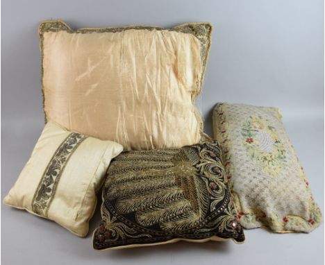 Eight cushions decorated with various styles of antique and vintage embroidery, tapestry and beadwork.  