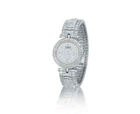 An 18k white gold and diamond wristwatch,  Van Cleef &amp; Arpels, circa 1995the circular dial pavé-set with single-cut diamo