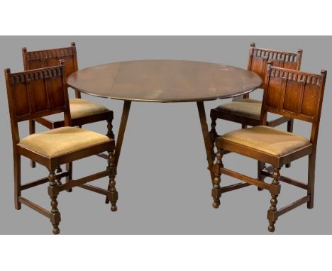 ERCOL TWIN FLAP DINING TABLE, 72cms H, 125cms W, 113cms D (open), 62cms D (closed) &amp; four chairs with carved detail panel