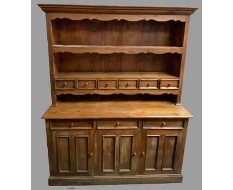 REPRODUCTION KITCHEN DRESSER, Eastern hardwood, having a two shelf rack with shaped frieze and six spice drawers over a shape