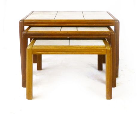 A nest of three Danish tile topped and teak framed coffee tables, max. w. 66 cm CONDITION REPORT: Splits and losses