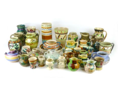 A group of thirty five pottery jugs, bowls and vases by Shorter & Sons including an Art Deco squat jug by Mobel Leigh CONDITI