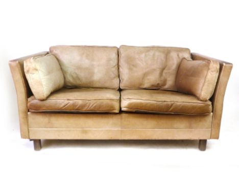 A Danish brown leather two-seater sofa on mahogany straight legs, in the manner of Borge Mogensen, l. 155 cm CONDITION REPORT