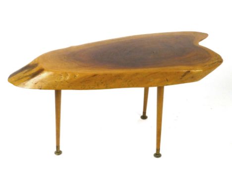 A rustic coffee table constructed using a turned trunk, on three beech tapering legs, l. 73 cm CONDITION REPORT: Wear commens