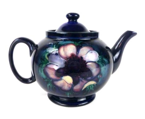A Moorcroft teapot and cover in the Anemone pattern, impressed marks, h. 14cm  CONDITION REPORT: Restored spout