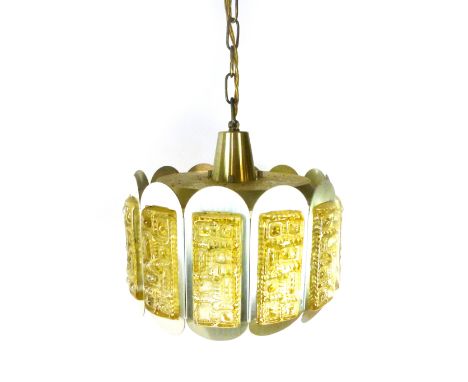 A 1970's aluminium and brass coloured ceiling light, the twelve segments with yellow moulded glass panels CONDITION REPORT: D
