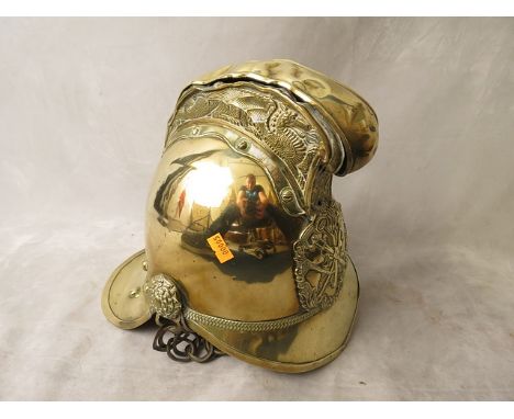 A late 19th/early 20th century brass Merryweather & Sons, Fireman's Outfitters, London, fireman's helmet with dragon comb hel